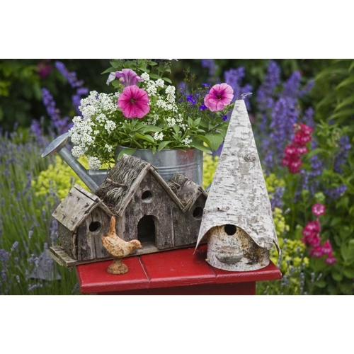 Bird houses and planter on garden table